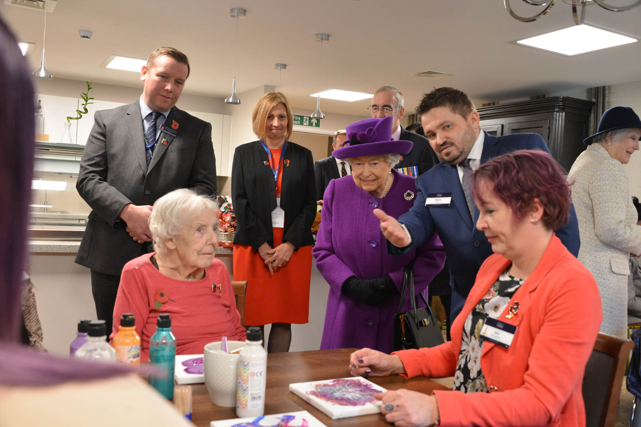 Queen Elizabeth II visiting residents in the RBVE village