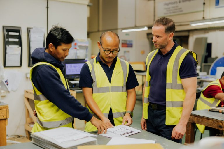 Three male veterans working at RBVE Britain's Bravest Manufacturing Co