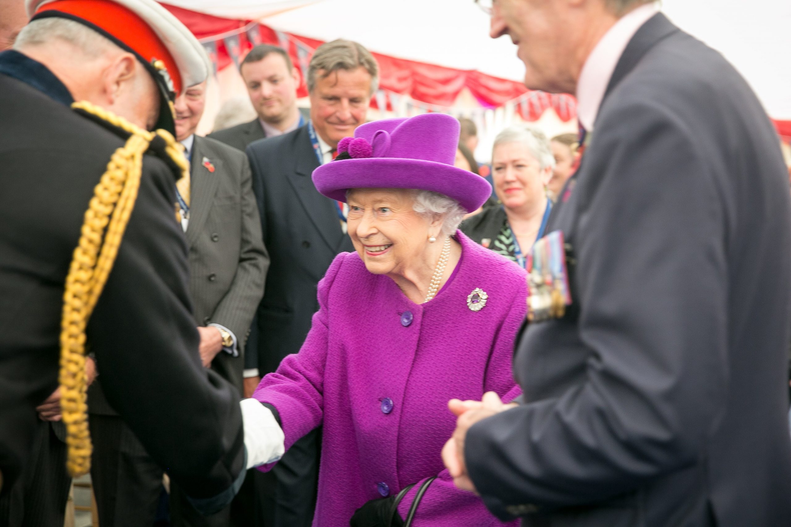 Queen Elizabeth shaking hands with veterans during RBVE visit