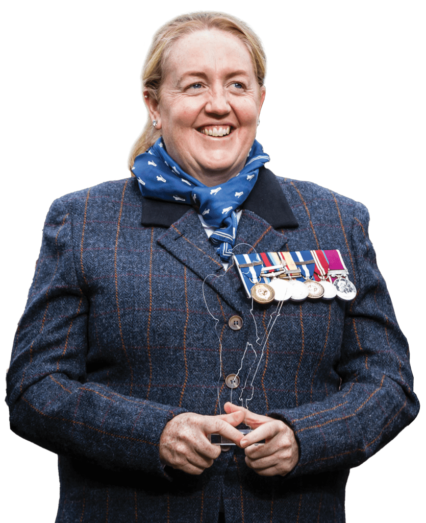 Veteran Vicky holding Tommy award