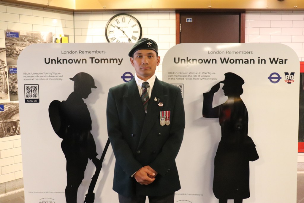 Gurkha veteran standing in front of unknown Tommies. Support for Veterans