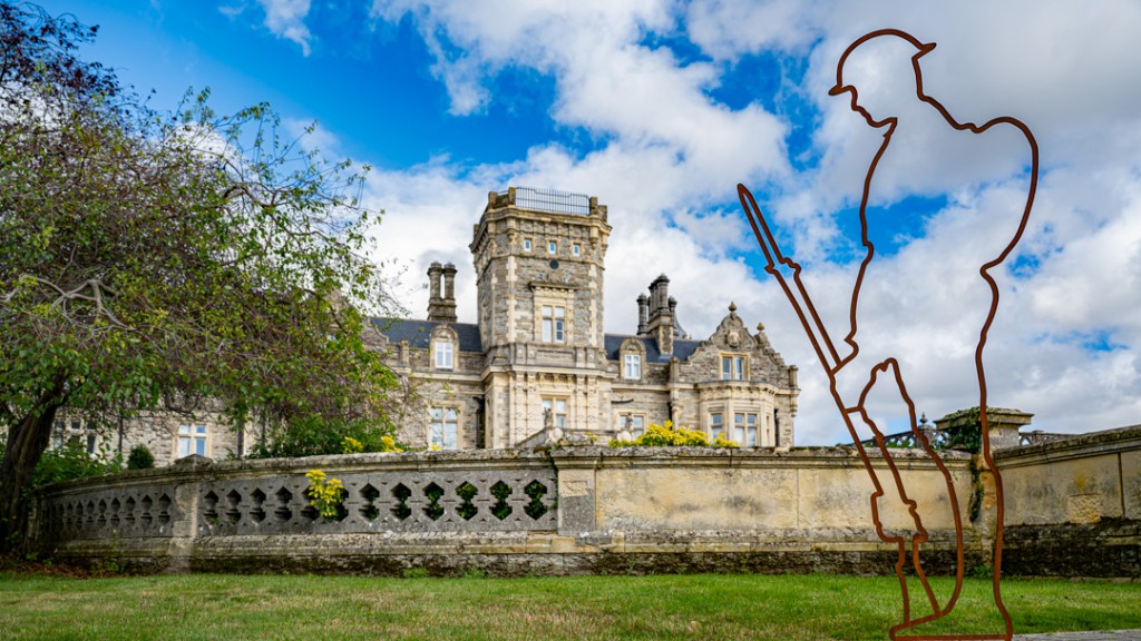 Tommy statue standing in front of the Jacobean style Preston Hall