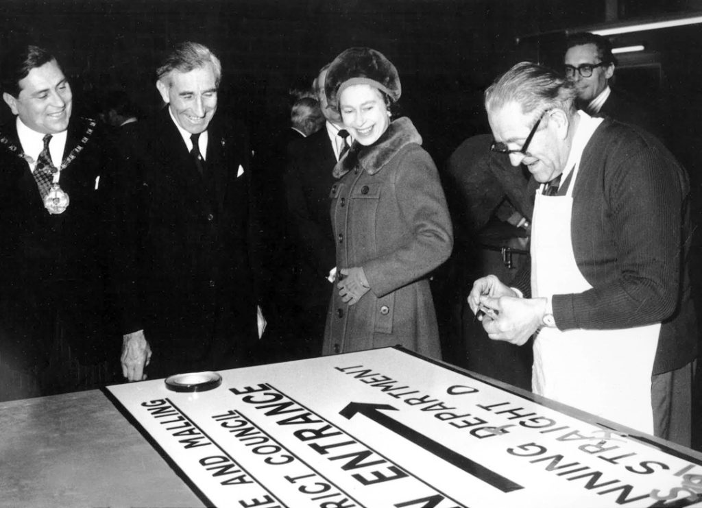 Queen Elizabeth learning about RBVE's (BBMC) signage company