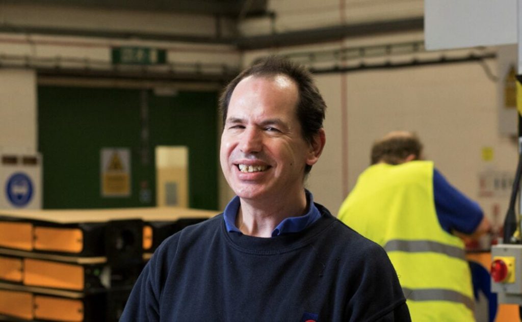 A prime example of who we help, Sean, smiling in fulfilment